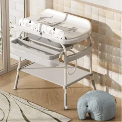 table à langer, baignoire et espace de rangement