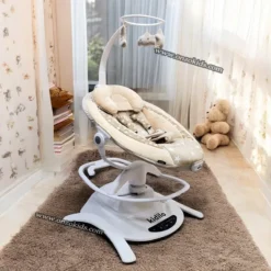 a baby swing on a rug kidilo