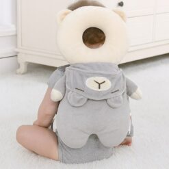 Coussin Peluche 2-en-1 - Protecteur de Tête et Doudou Ludique