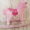 Cheval à bascule en rose