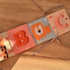 Livre bébé double face en tissu : fold and play