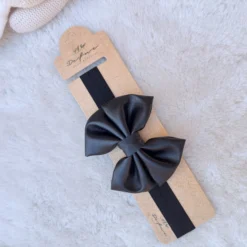 Serre-tête en noeud papillon: douceur et féminité - Noir
